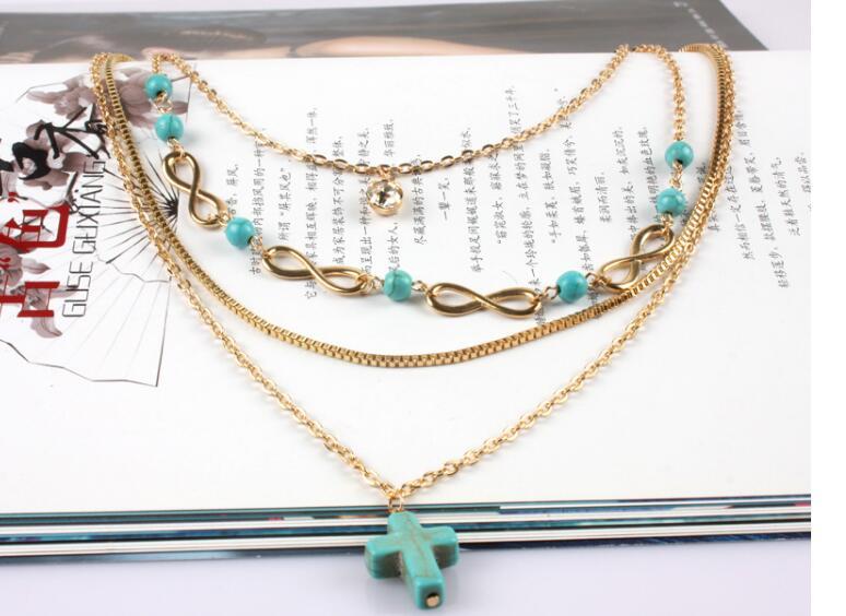 Croix turquoise multi-rangs COLLIER