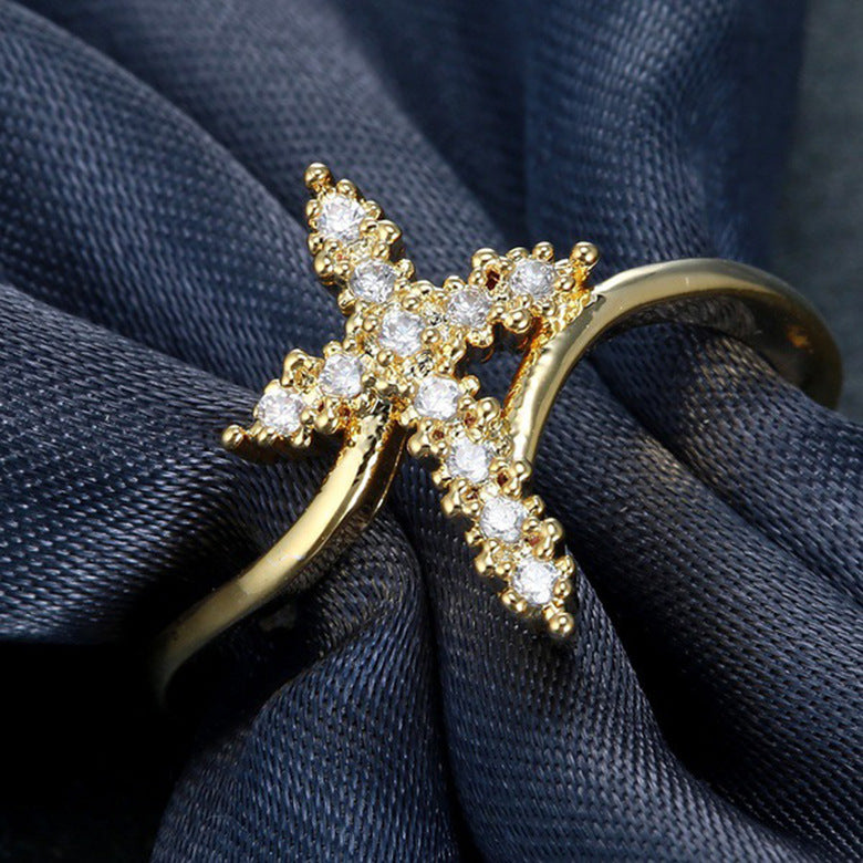 Croix avec strass sur BAGUE
