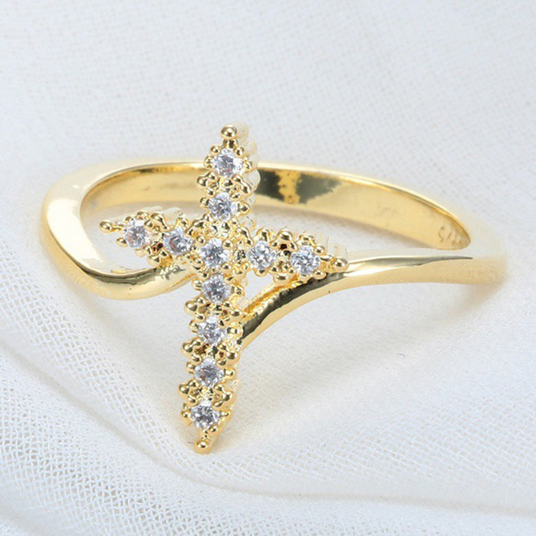 Croix avec strass sur BAGUE