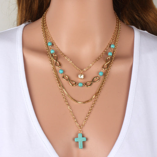 Croix turquoise multi-rangs COLLIER