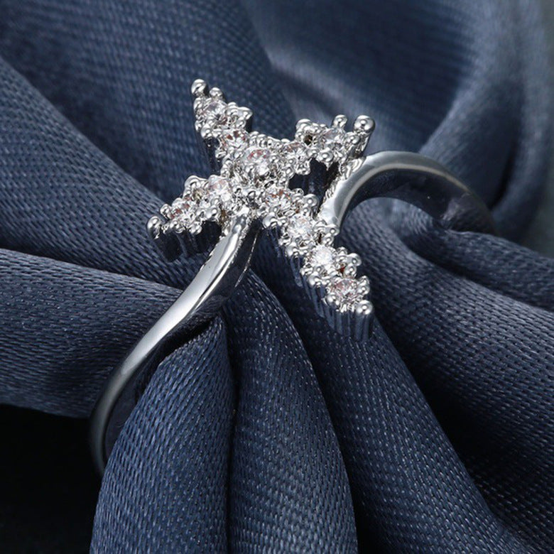 Croix avec strass sur BAGUE