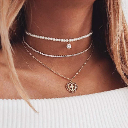 Perles et croix dans un coeur multi-rangs COLLIER